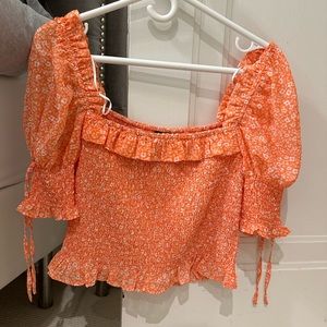 Orange floral puff sleeve top from Dynamite